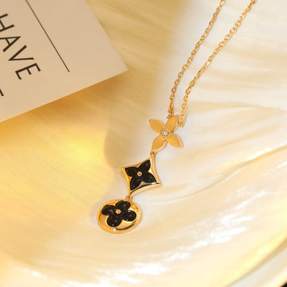 [AW]STAR AND SUN ONYX ROSE GOLD NECKLACE