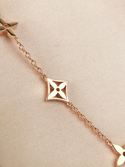 [AW]STAR AND SUN 7 MOTIFS GOLD BRACELET