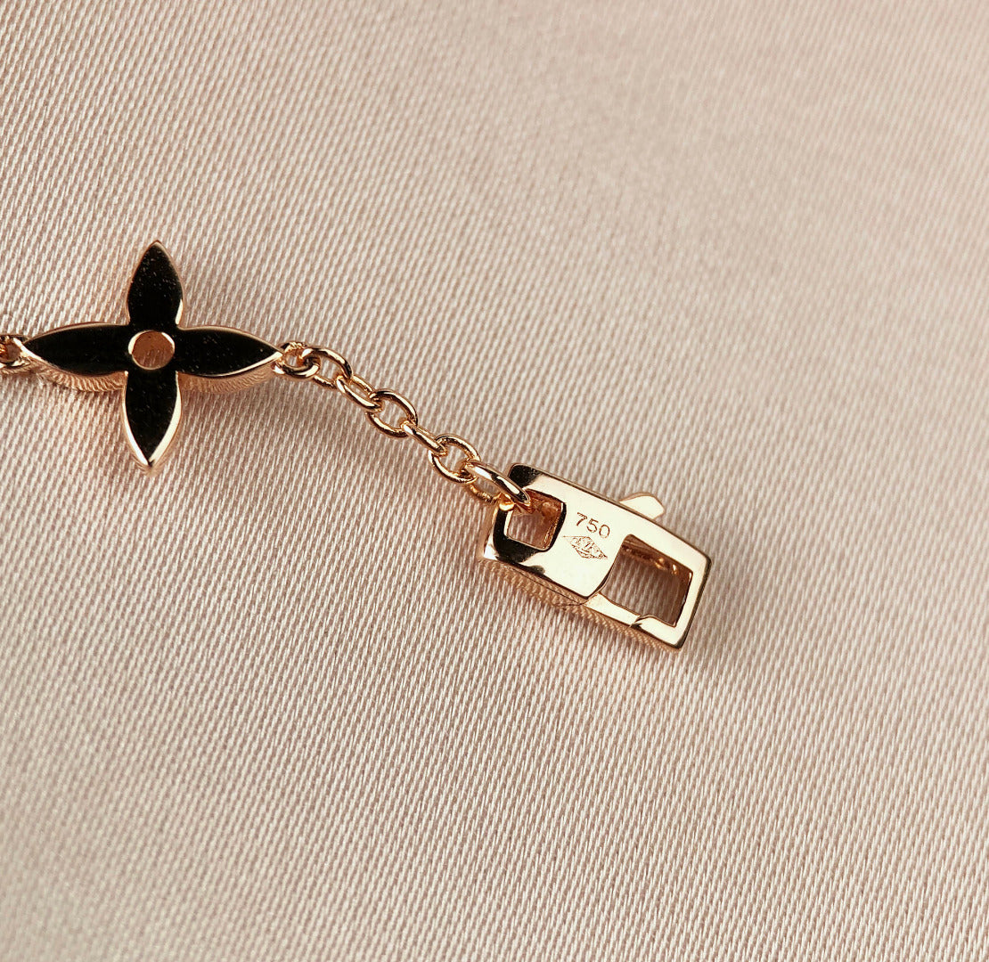 [AW]STAR AND SUN 7 MOTIFS GOLD BRACELET