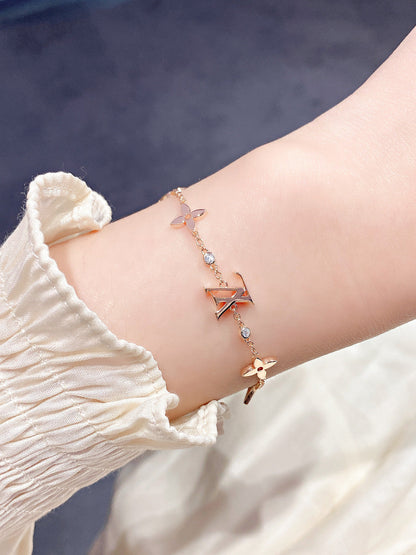[AW]STAR AND SUN 7 MOTIFS GOLD BRACELET