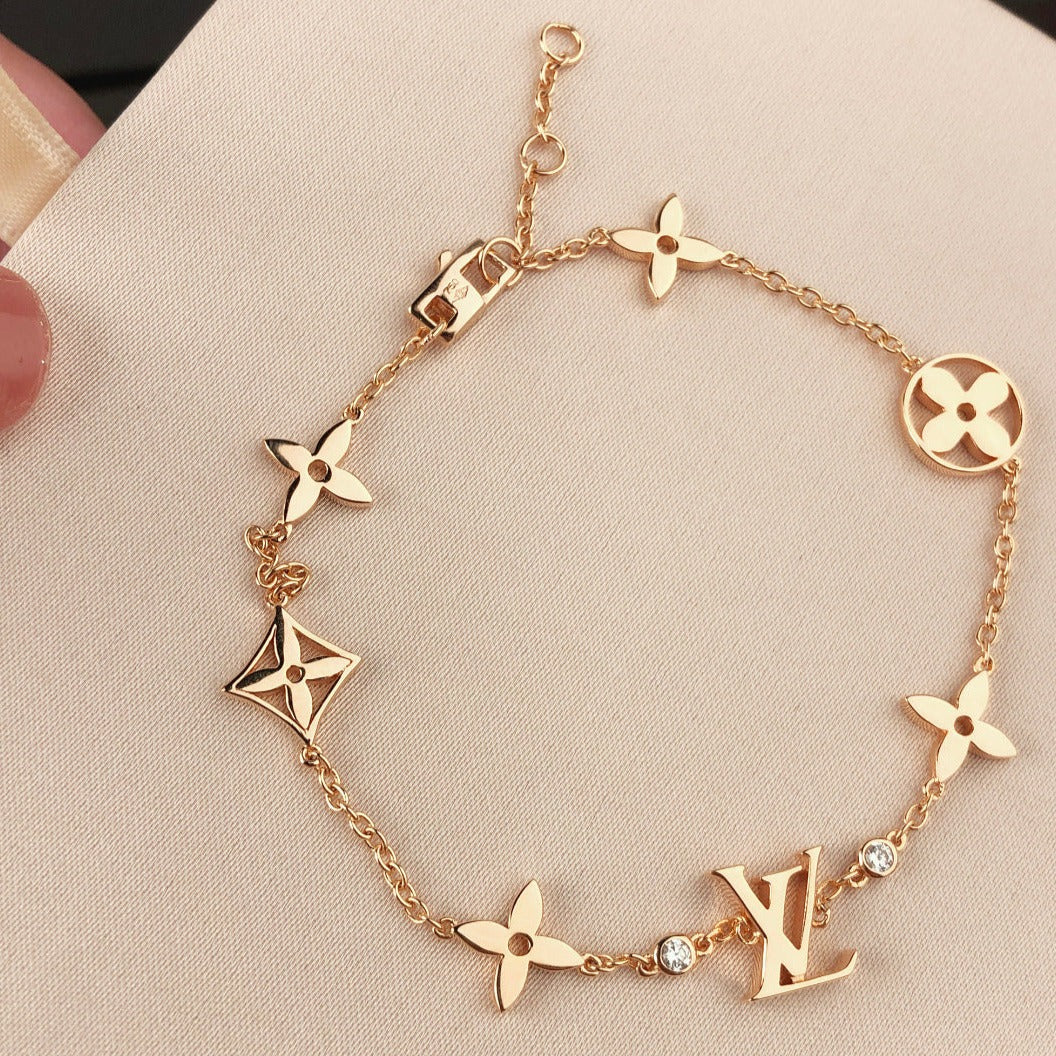 [AW]STAR AND SUN 7 MOTIFS GOLD BRACELET