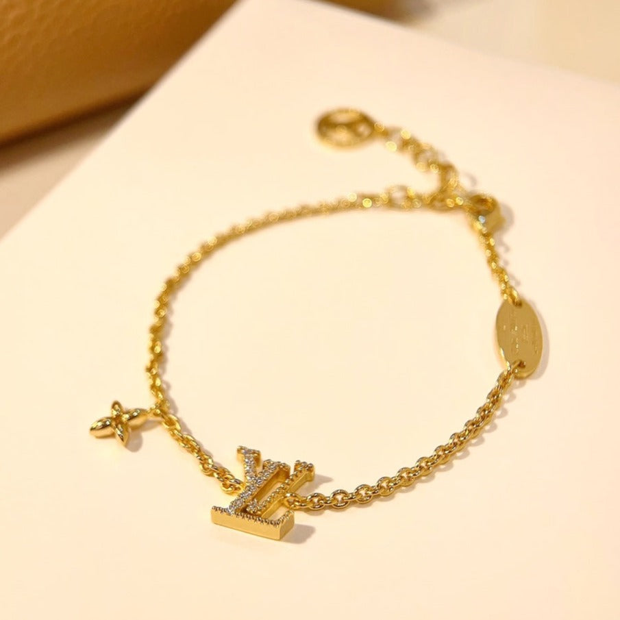 [AW]LOGO STAR MOTIF GOLD BRACELET