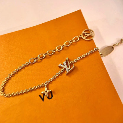[AW]LOGO STAR MOTIF GOLD BRACELET