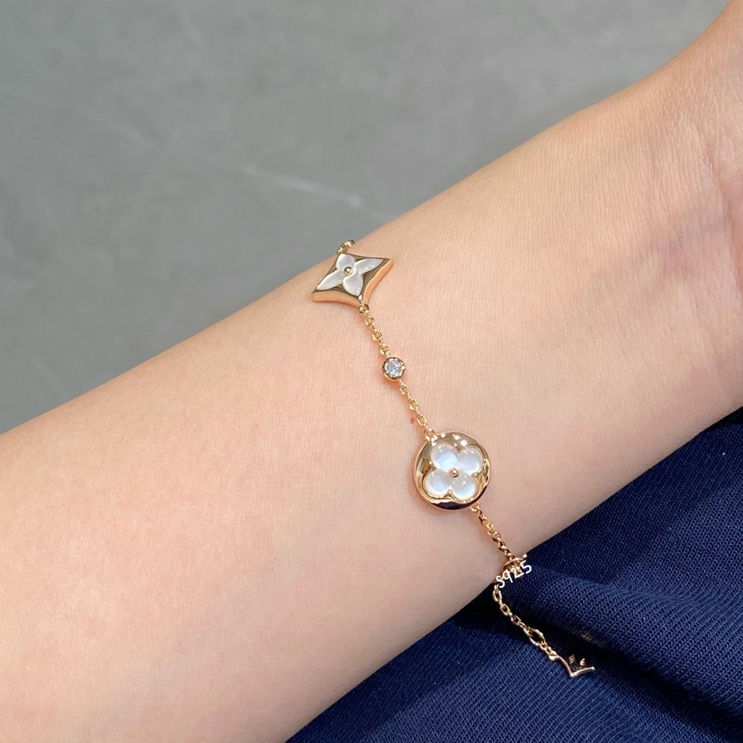 [AW]STAR AND SUN 4 MOTIF WHITE MOP ROSE GOLD BRACELET