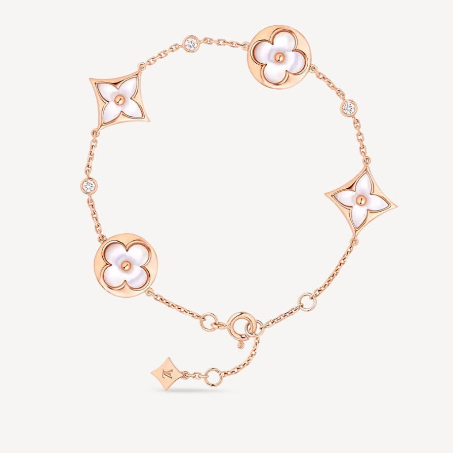 [AW]STAR AND SUN 4 MOTIF WHITE MOP ROSE GOLD BRACELET