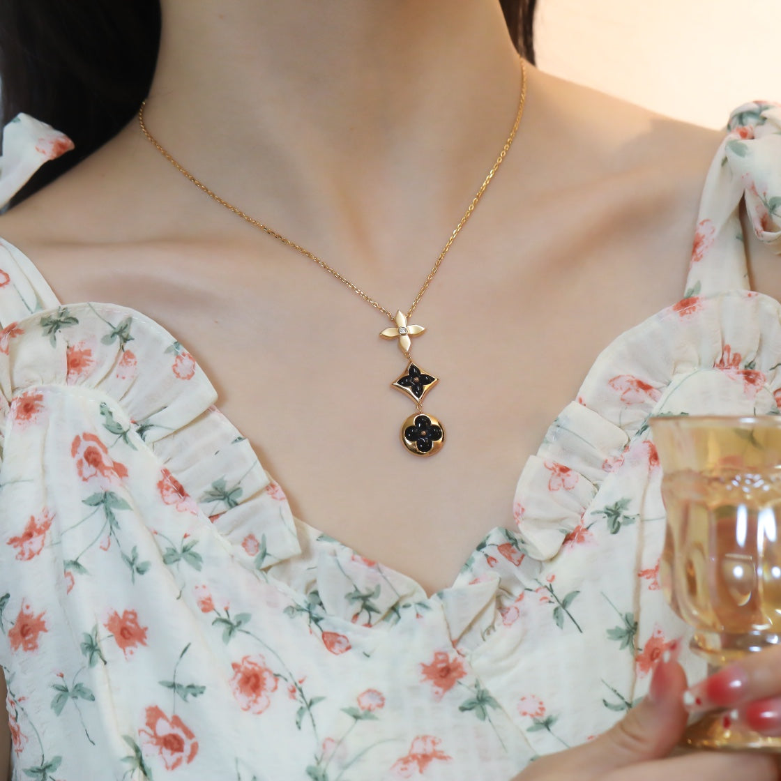 [AW]STAR AND SUN ONYX ROSE GOLD NECKLACE