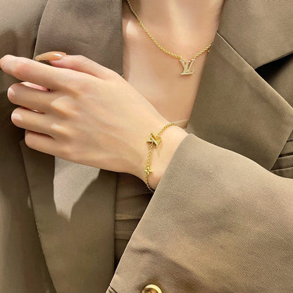 [AW]LOGO STAR MOTIF GOLD BRACELET
