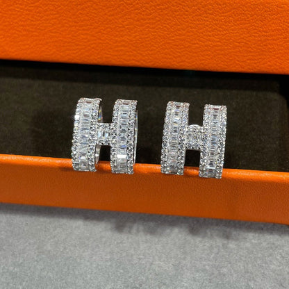 [AW]H STUD EARRINGS WITH SILVER DIAMONDS