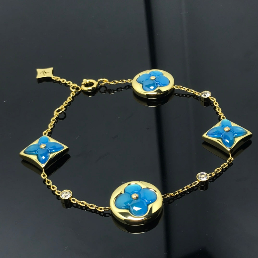 [AW]STAR AND SUN 4 MOTIF BLUE BRACELET